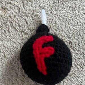 Handmade Crocheted Black Bomb with Red Letter